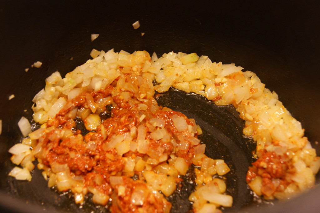Sauteing the garlic, onions  and chipotle in adobo.