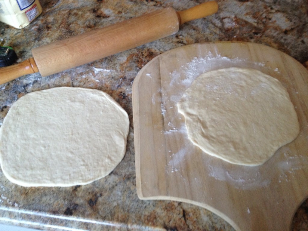 Roll out on a lightly floured surface.  Use a wooden pizza peel when inserting into the oven.