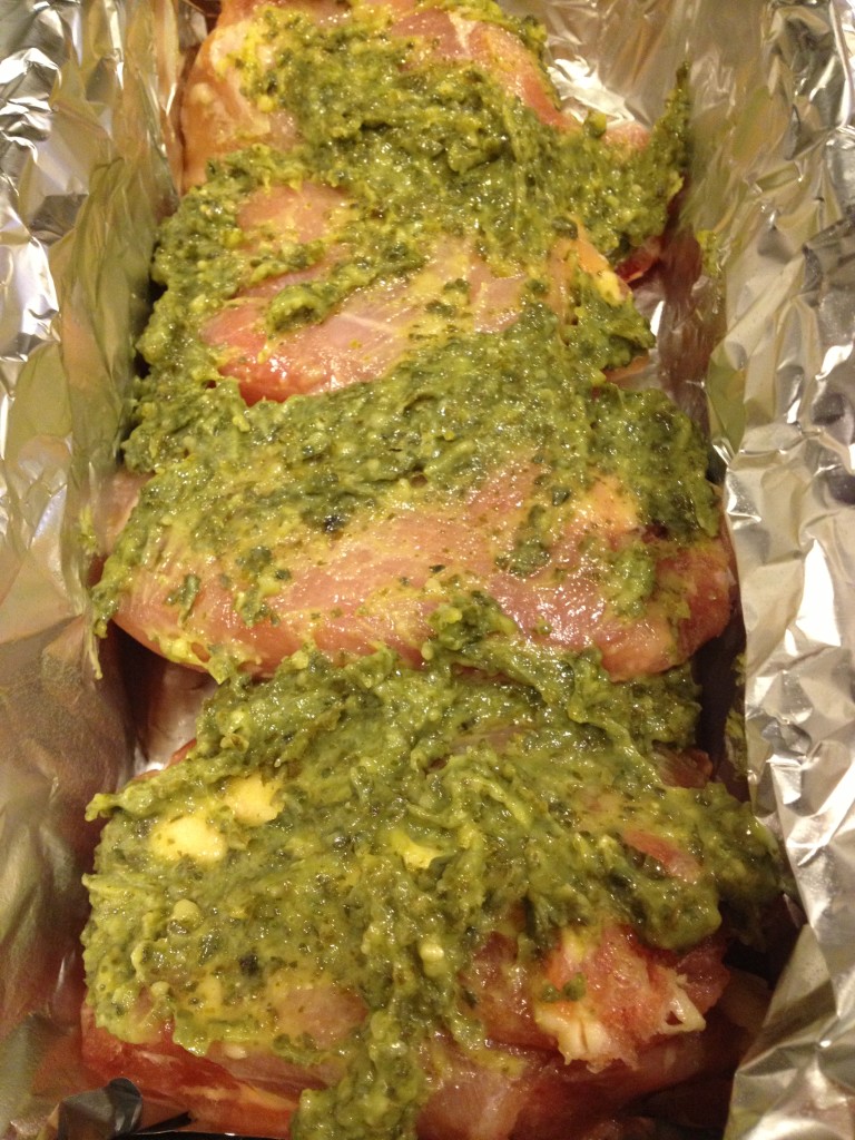 Liberally rub the thighs with basil pesto - I use store bought in this recipe for faster prep.  Homemade would be even better...