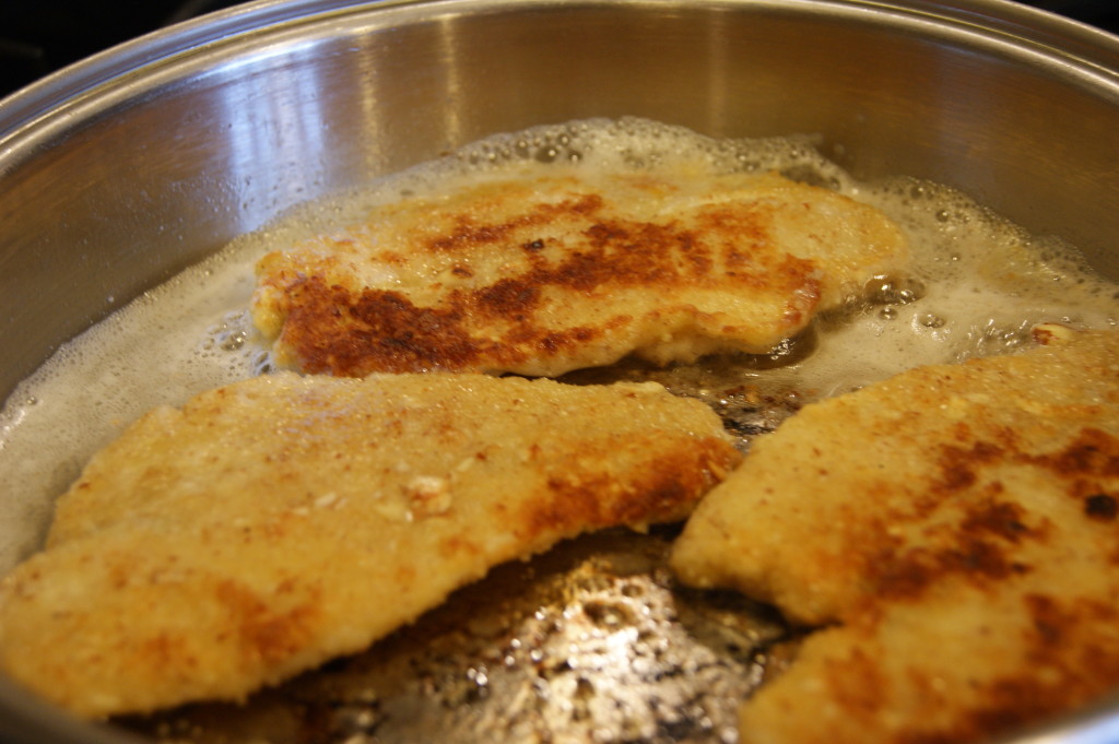 Pan frying the flounder.  Get the pan and cook about 3 minutes per side until golden brown.
