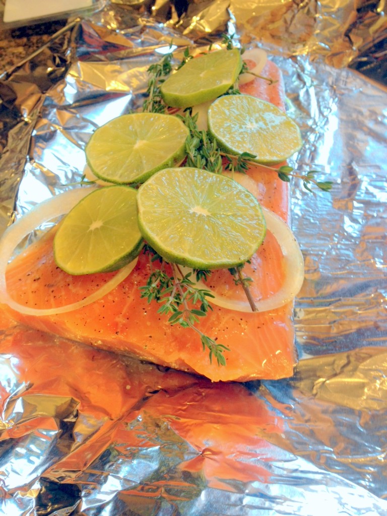 Add the sliced lime and seal the foil to form a pouch - this keeps the fish super moist throughout the cooking process.