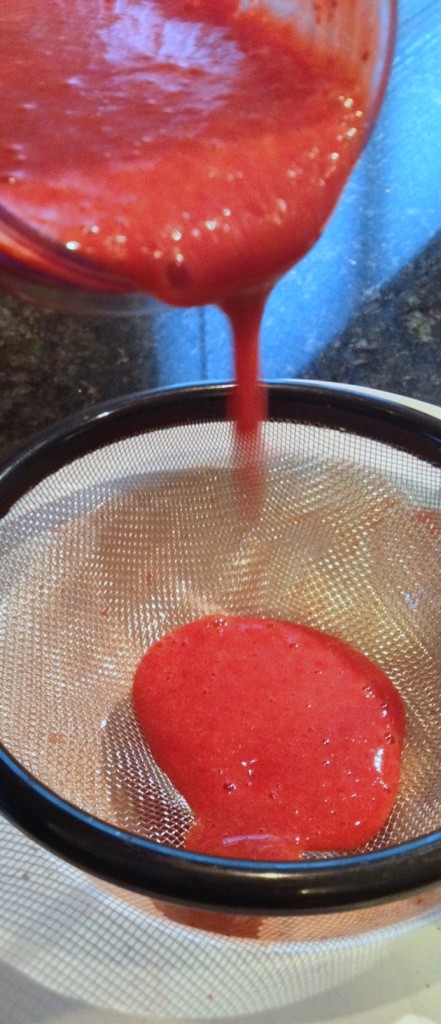 After pureeing, strain through a fine mesh strainer or cheese cloth.
