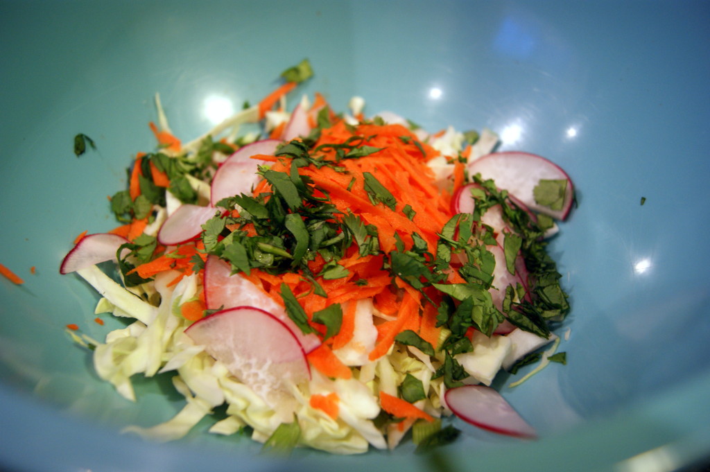Cool, creamy and crunchy slaw.  Don't dress your slaw too far in advance.  60 - 90 minutes is all this slaw needs.  Any longer and everything gets wilty.
